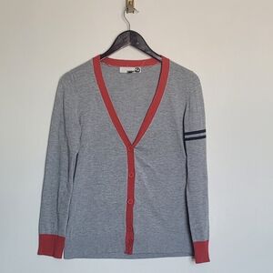 A grey, red and blue cardigan by Amnesia